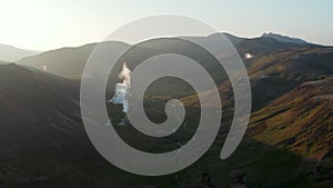 Reverse birds eye aerial view of Thorsmork mountains and river, highlands of Iceland. Stunning drone view of icelandic