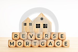 Reverse mortgage concept. Words on wooden blocks on table
