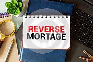 Reverse mortgage form on a table and money.