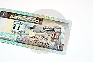 Reverse side of an old 1 KWD one Kuwaiti dinar banknote cash money features Vignette of Mina Al-Shuwaikh
