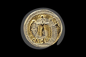 Reverse side of a Roman Aureus Gold Coin of Julius Caesar