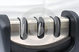 Reversible manual knife sharpener. Close-up subject