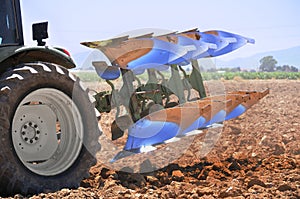 Reversible Plough on a Tractor photo