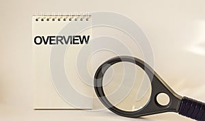 Review, the text is written on the calendar, near a magnifying glass