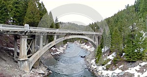 Review view of an arched bridge on the Payette River in Idaho