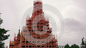 Revival of Christianity. Restoration of the old monastery. Construction of scaffolding. Renovation of the facade of a historic hou