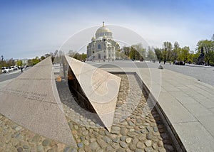 Revolutionary memorial - quenchless flame at Yakornaya square and Orthodox Naval cathedral of St. Nicholas in Kronshtadt