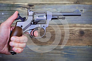 Revolver gun in a human hand