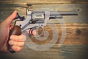 Revolver gun in a human hand