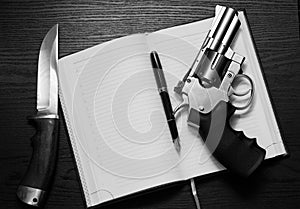 Revolver and hunting knife