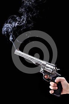 Revolver with smoke photo