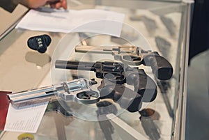 Revolvers on the counter in the gun shop