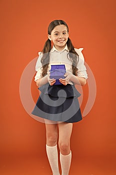 Rewarding for efforts. Girl opening gift. Tidy adorable pupil open gift box. Educational program for gifted kids. Happy