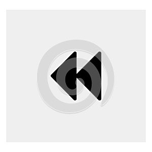 Rewind button icon. Gray background. Vector illustration.