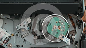 Rewind of magnetic videotape in the VCR mechanism.The sequence of video footage. magnetic videotape in the VCR mechanism