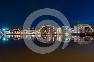 Reykjavik city hÐ°ll, under the morning sky and light aurora