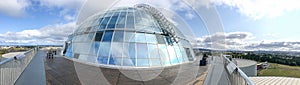 REYKJAVIK, ICELAND - AUGUST 11, 2019: Perlan Wonders of Iceland glass-domed fine restaurant terrace on a sunny summer day