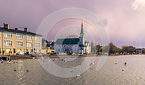 Reykjavik - May 02, 2018: Panorama of Reykjavik from the Tjornin Lake, Iceland