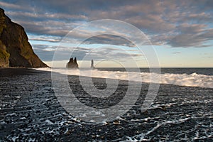 Reynisdrangar are basalt sea stacks situated under the mountain Reynisfjall near the village Vik i Myrdal, southern Iceland