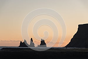 Reynisdrangar in sunset.Reynisfjara is a world-famous black-sand beach found on the South Coast of Iceland