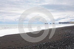 Reynisfjara Beach and view of Dyrholaey rocks