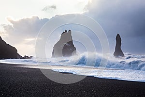 Reynisfjara or better known as Black Sand beach view during sunrise