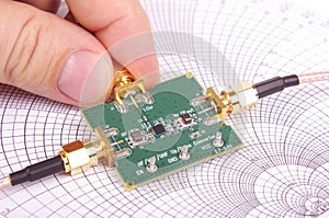 RF engineer inspect microwave mixer PCB