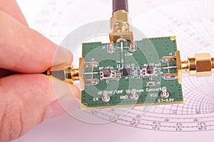 RF engineer inspect microwave mixer PCB