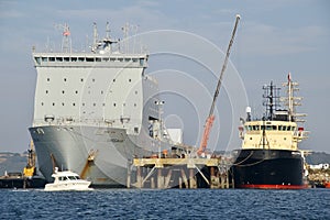 RFA Cardigan Bay, a Bay-class landing ship dock of the Royal Fleet Auxiliary, and The Anglian Princess, an Emergency tow vessel