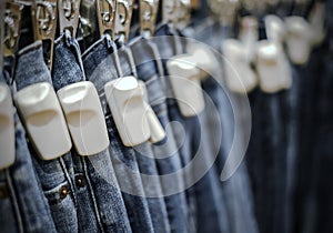 RFID hard tag on blue jeans pants in shop