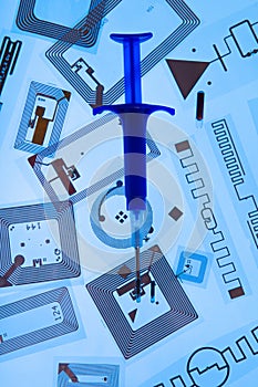 RFID implantation syringe and RFID tags