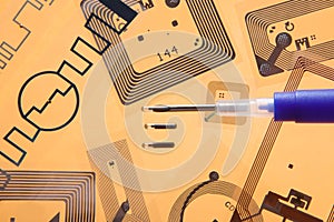 RFID implantation syringe and RFID tags