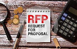 RFP- Request For Proposal written in notebook.