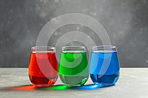 Rgb color water in glass on table