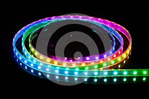 RGB LED strip on reel with black background photo