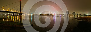 Rheinufer an der DÃÂ¼sseldorfer Altstadt am Abend im Nebel und Hochwasser photo