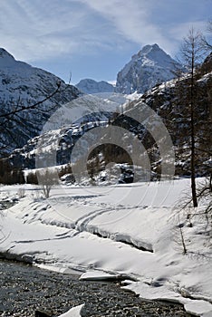 Rhemes valley and Granta Parey mountain in winter, Aosta, Italy