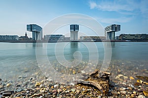 Rhine river in cologne with crane houses