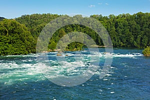 The Rhine river just above the Rhine Falls waterfall in Switzerland