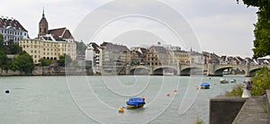 Rhine river and Mittlere brucke bridge, Basel photo