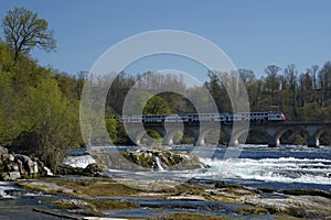 Rhine river near Rhine Falls. There is Rhine bridge at town Laufen.