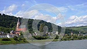 Rhine river shore, boats and historic buildings, churches, castles