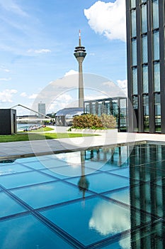 Rhine Tower seen from the Media Harbor past the Hyatt Hotel