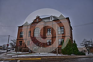 Rhinelander WI historic city hall building on a snowy day