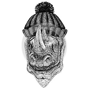 Rhinoceros, rhino Cool animal wearing knitted winter hat. Warm headdress beanie Christmas cap for tattoo, t-shirt