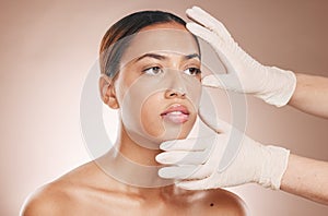 Rhinoplasty, hands and woman consulting for face botox, beauty implant or makeup cosmetics. Facial consultation photo