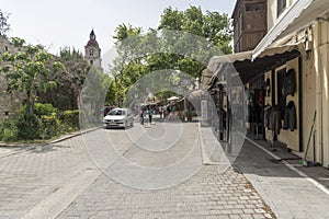 Shops and clock tower Rhodes town Greece