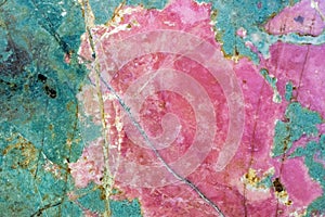 Rhodonite pink massive. Close-up of manganese inosilicate marble like surface photo