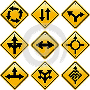 Rhombic yellow road signs with arrows directions