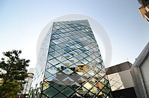 Rhomboid-grid glass building in tokyo